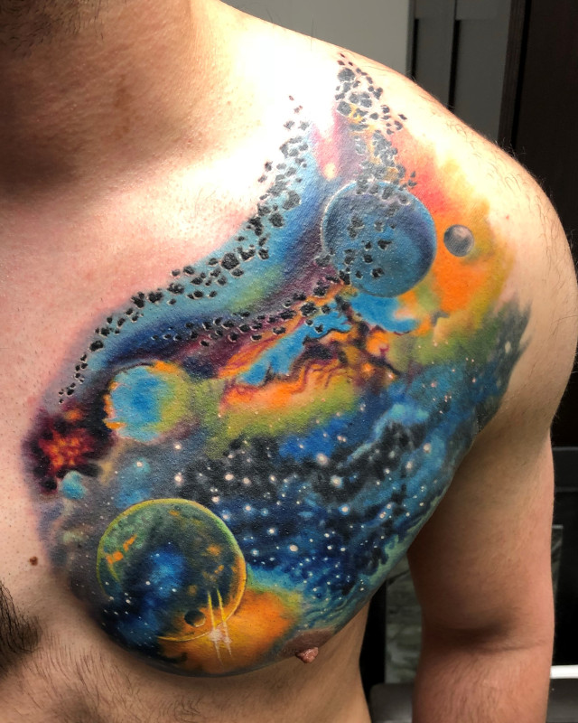 Chest tattoo of the universe done in full color by Shaine Smith of Sacred Mandala Studio.