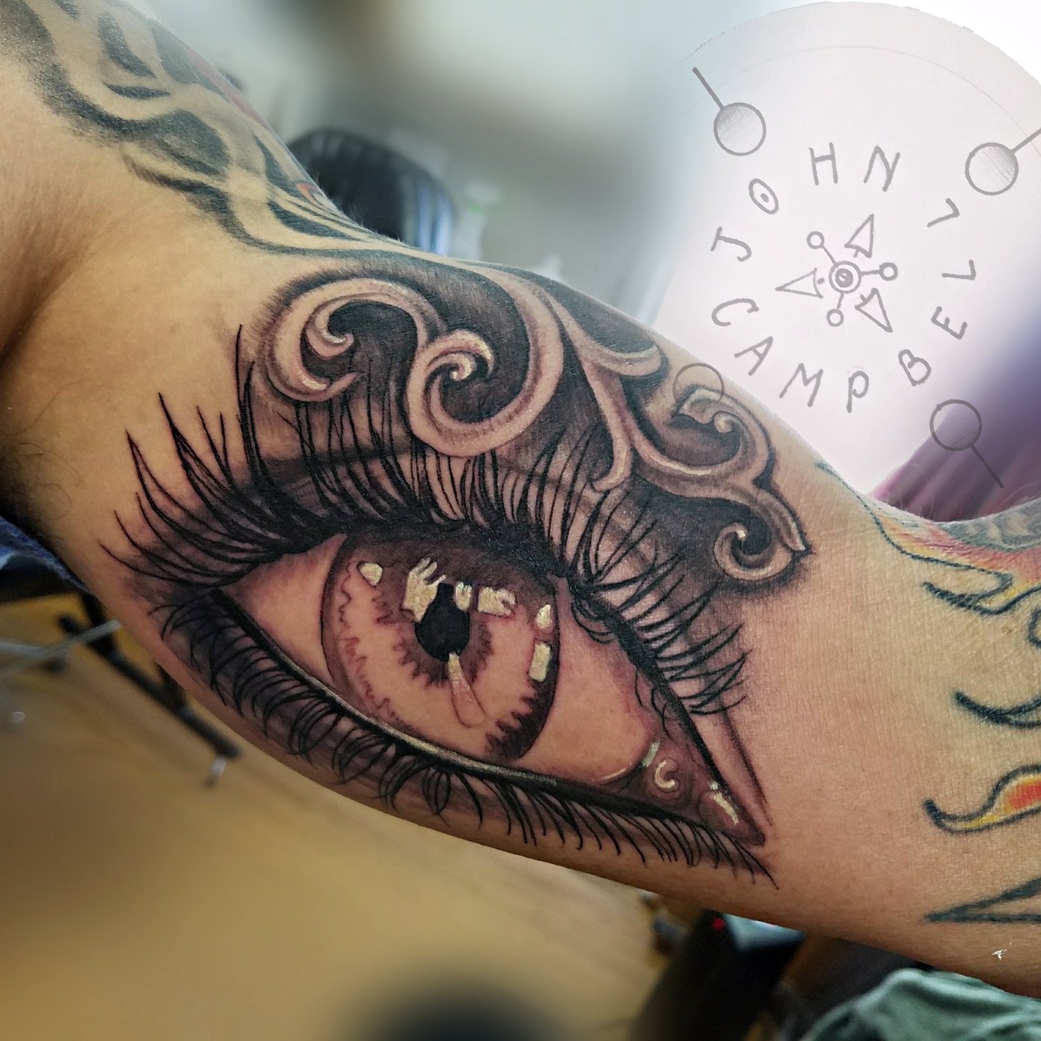 Color Tattoo of an Eye by Tattoo Artist John Campbell for Sacred Mandala Studio in Durham, NC.