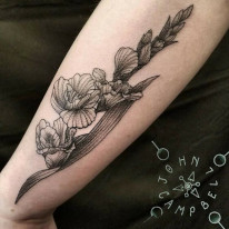 John Campbell Iris tattoo done in black and grey.