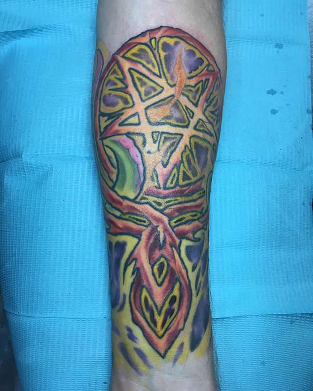 Full color pentagram tattoo. Book a custom tattoo with Chris at Sacred Mandala Studio - Durham, NC.