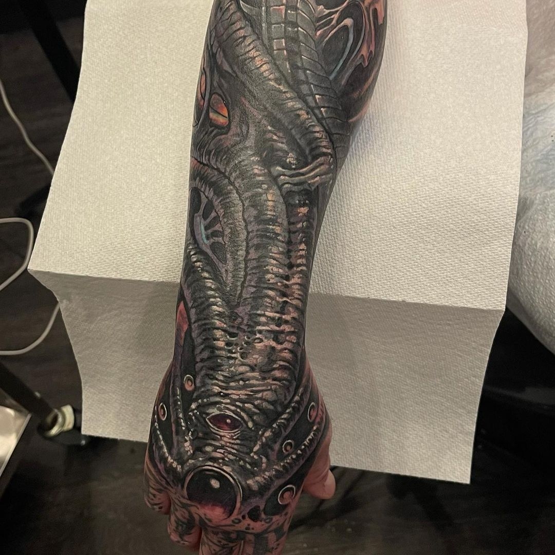 Forearmm and hand full color sleeve biotech tattoo by Shaine Smith of Sacred Mandala Studio.