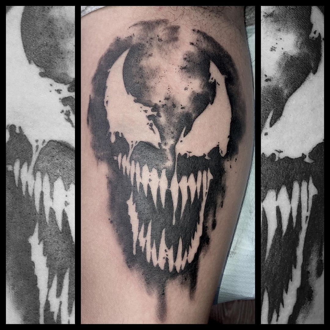 Venom black and grey fine line tattoo. Book a custom tattoo with Chris at Sacred Mandala Studio - Durham, NC.